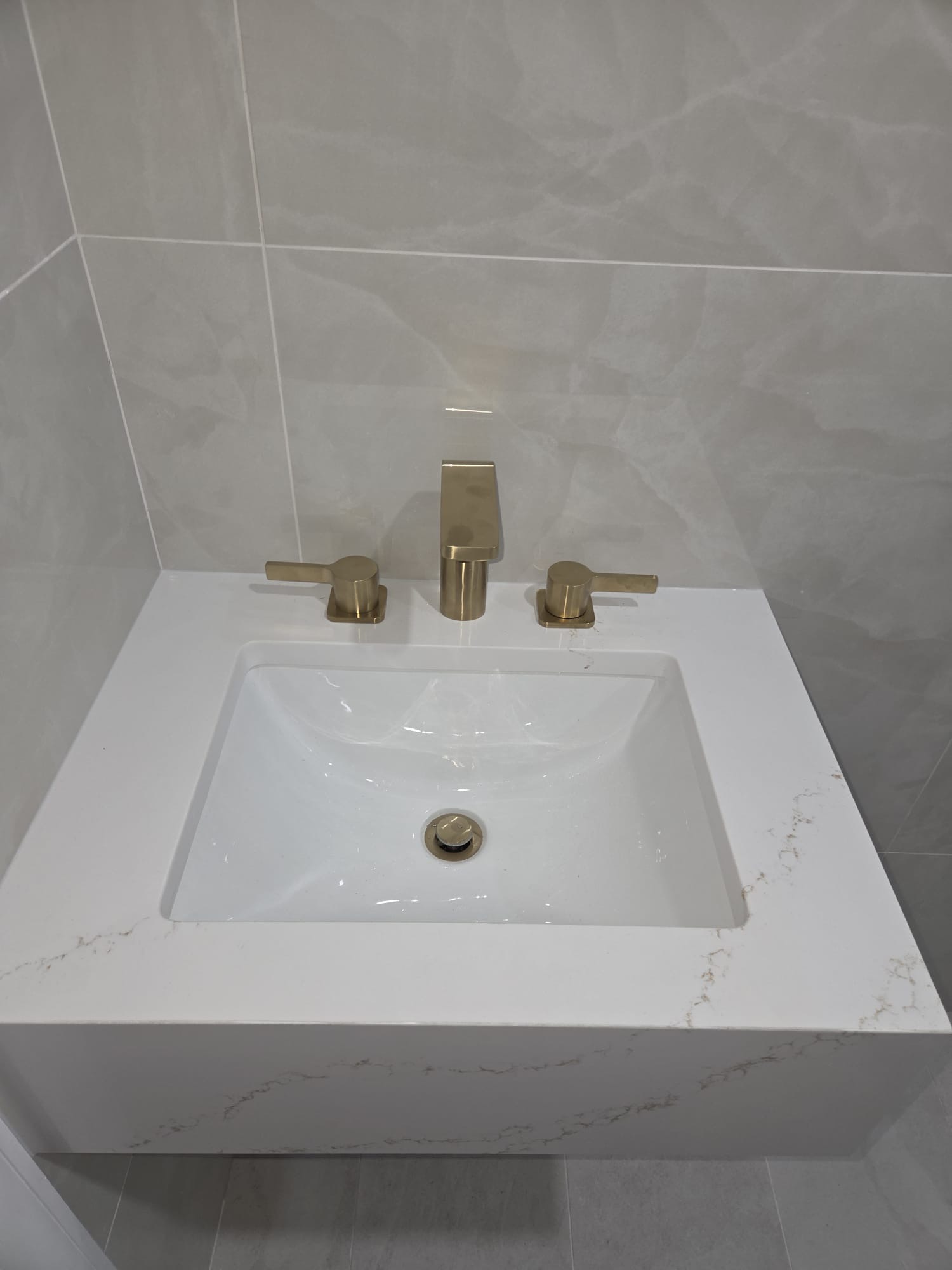 Bathroom faucet installation, wide angle