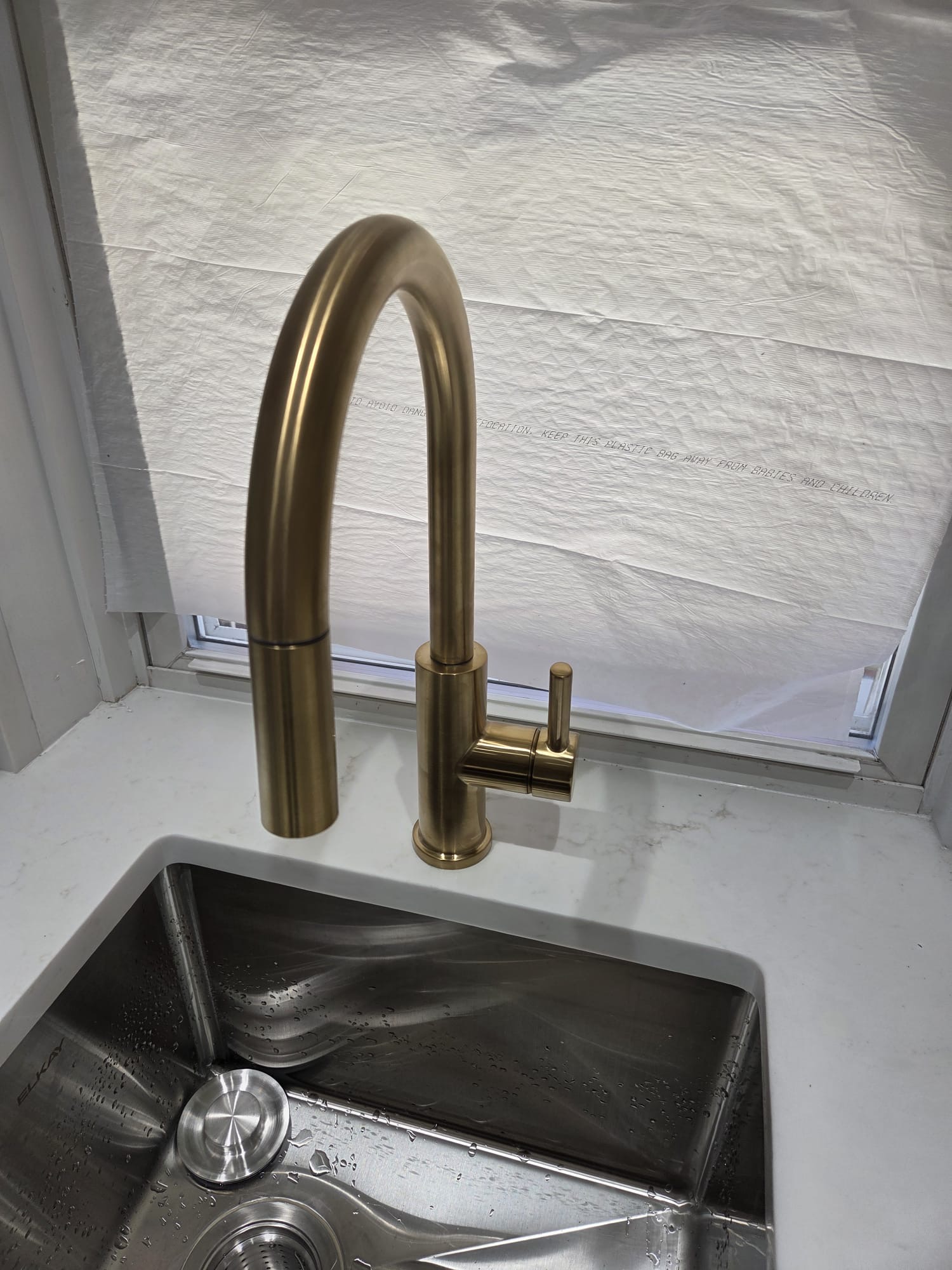 Kitchen faucet installation, close angle