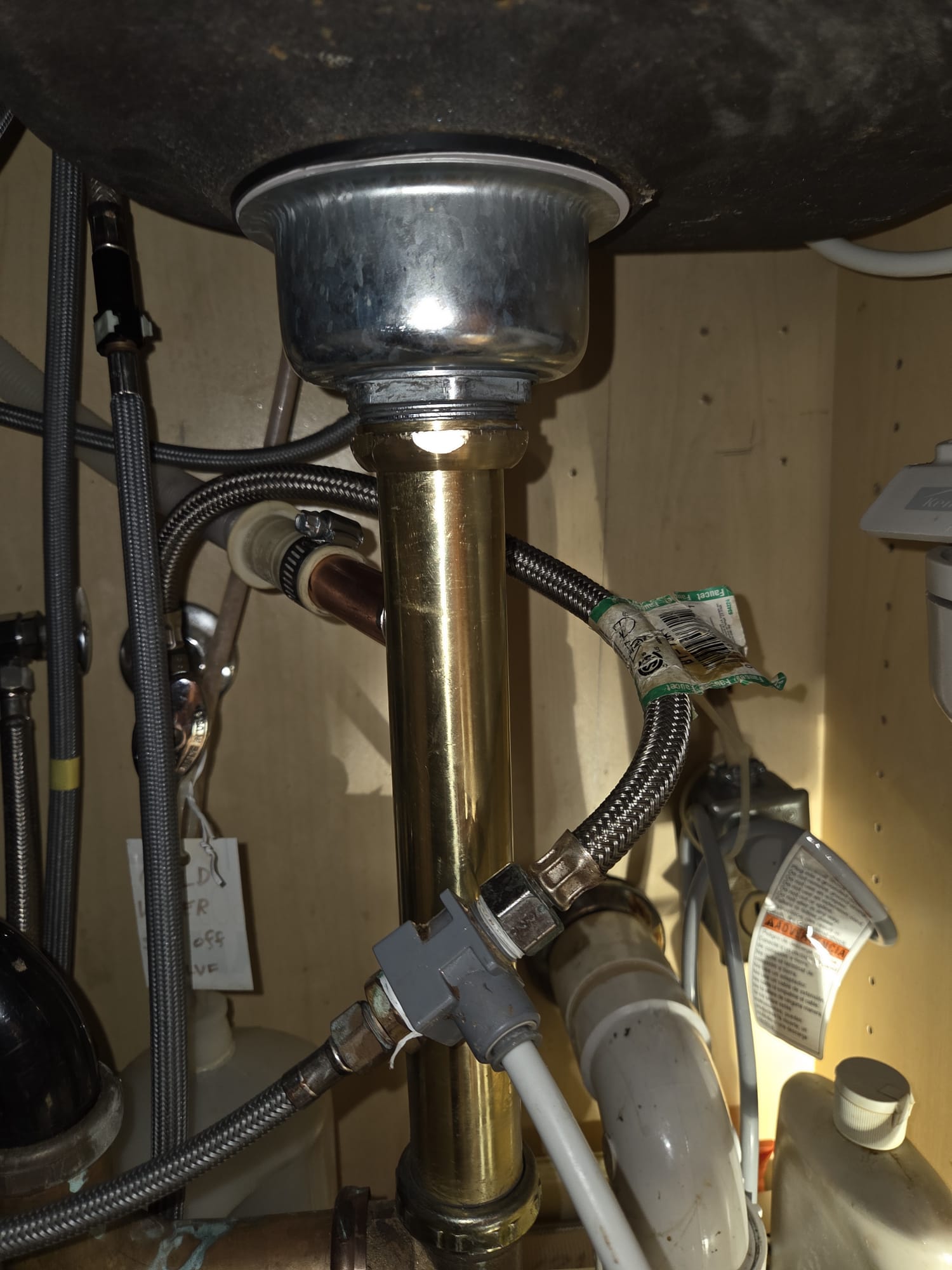New brass sink drain tailpiece after replacement