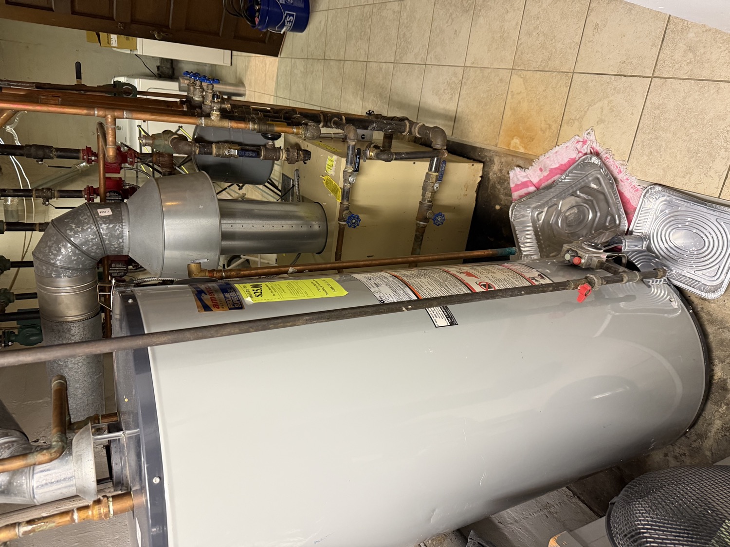 Old leaking water heater before replacement